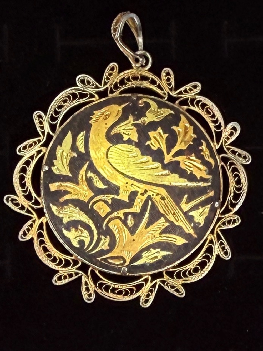 Vintage 1950s aged Goldtone filigree black Damascene Bird pendant